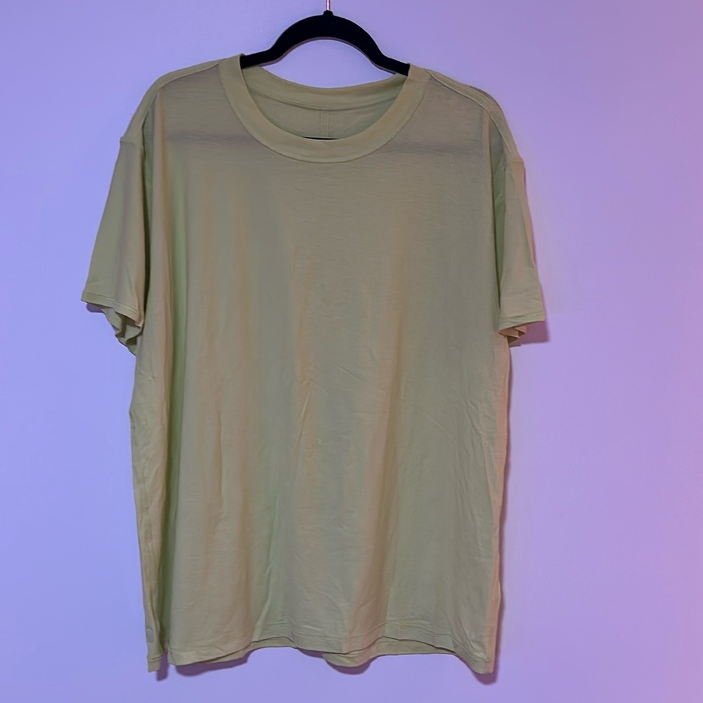 Size 12/14 lululemon all yours tee in neon yellow gently worn